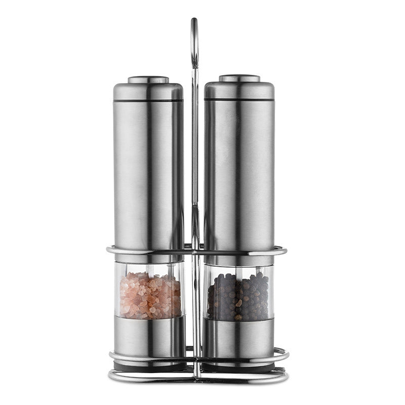 Two Stainless Steel Electric Pepper Mills With Racks